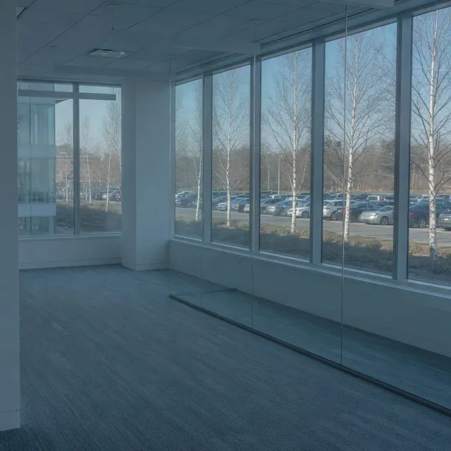 Empty Route 128 office corridor with a wall phone in Wakefield